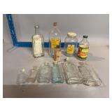 Old glass bottles including Jack Spratt and Watkins