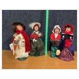 Four Byers Choice carolers-all women