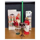 Byers Choice Mr & Mrs Claus carolers w music stand and cardboard houses