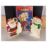 Wooden cutout Santas and snowmen, lighted reindeer ridge decoration