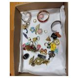 Costume jewelry includes rings, bracelets, brooches