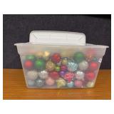 Large tote of ornaments and tree topppers