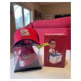 Harry Caray bobblehead, ball cap, and Ozzie Smith mini helmet