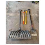 Axe, pick, snow shovel and spud