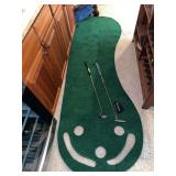 Putting green and 2 putters