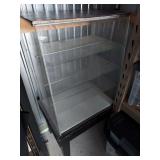 Glass Display Cases. Open-back glass display case on wood legs measures 46.75"H x 24"W x 17.5"D overall. Hexagonal case measures 18"x10"x9" and missing door latch.