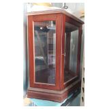 Display case, mirror backed, glass shelf included, lighted but untested (worked last time it was used long ago), 29.5"H x 28"W(back)/16"W(front) x 10.5"D
