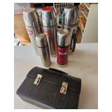 Lunch boxes and thermoses and a time clock to make sure you don