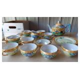 China and glassware includes Order of the Eastern Star, Asian influence, Shawnee duck pitcher, floral pattern, beer steins, etc