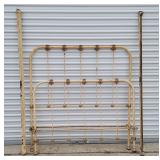 Antique iron bed frame with headboard and footboard (fits "full" size mattress). 2 original steel rails lock into HB & FB for easy assembly. Cream-colored finish with gold accents; finish is chipped b