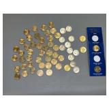 43 Sacajewa dollars, 11 Susan B Anthony dollars and 4 Presidential dollars