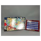 Framed quarters of the fifty states and 50 State quarters in collector map by year of release, both complete