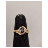 Women’s sapphire and diamond ring size 4.5 Marked 10K and A inside circle