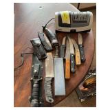 Hunting knives, kitchen knives and sharpeners