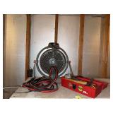 Fan, jumper cables and toolbox of tools