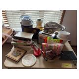 Stainless steel roaster, toaster, cheese cutter, cookbooks and more