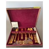 Mismatched set of “gold” flatware Not sorted, not counted