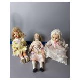 Two composition dolls w sleep eyes and a bisque doll w cloth body
