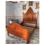 Walnut full size bed with curved footboard Headboard measures 57 x 74 tall
