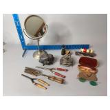 His and hers beauty group includes curling irons, trinket boxes, shaving mirror and brush, etc