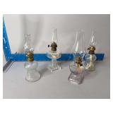 Four mini oil lamps