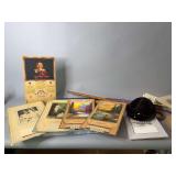 Box of ephemera, hats, cane, umbrella, pictures
