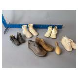 Baby shoes of all kinds including wooden cobblers and ceramic!