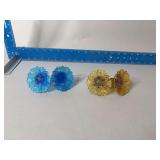 Two pair glass curtain tie backs, amber and blue