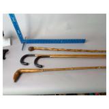 Four walking sticks
