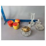 Dresser items include clear glass perfume bottles, apple trinket jars, hair receiver