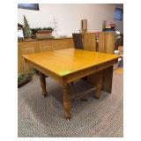 42" square oak table with (3) 11" leaves