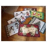 Seven holiday rugs, most new