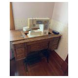 Quarter sawn oak treadle sewing machine cabinet w/ modern sewing machine Front panel needs repair
