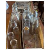 Various size dairy bottles and accessories