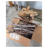 Boxes of firewood and sticks twigs