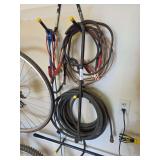 Jumper cables, hose and bungee straps