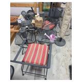 Wrought Iron Patio set- two side tables, round table, umbrella with two chairs plus all contents on table