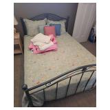 Queen bed with pillows, mattress, headboard, footboard and extra bedspread