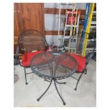 Two Matching Wrought Iron Chairs with 24" Round Table