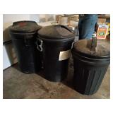 3 black trash cans