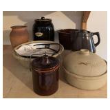 Stoneware items includes cookie jar, pitcher, potato baker, indoor grill, cheese crock
