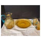 Amber pitcher w two matching glasses and under plate
