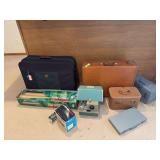 Vintage suitcases, brown craft paper, pana-vue, Argus slide projector