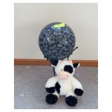 Gazing ball and plush cow