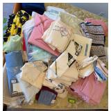 Assortment of bed linens and towels