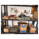 On shelf and pegboard includes nails, sprinkler, screws, Stanley organizer, etc