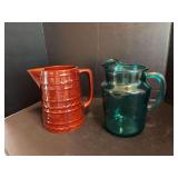 Turquoise glass pitcher and MarCrest stoneware pitcher, chip on lip