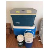 Two coolers and a thermos for each one