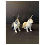 Two cast iron hand painted rabbits Approx 4.5” tall