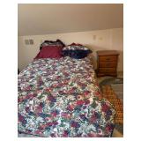 Full size mattress and box spring with metal bed frame and three drawer nightstand